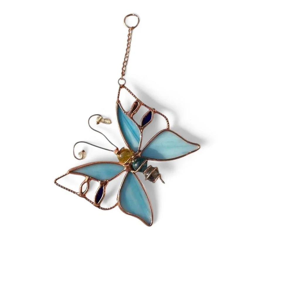 Blue stained glass butterfly suncatcher with copper wire frame and glass orbs